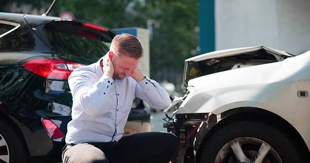 Attorney reviewing legal documents and accident claim paperwork